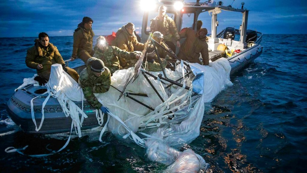 US Navy sailors retrieved the suspected spy balloon off the coast of South Carolina. Pic: AP 